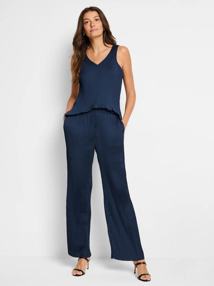 Navy blue pleated jumpsuit; sleeveless top, wide-leg pants. V-neck.
