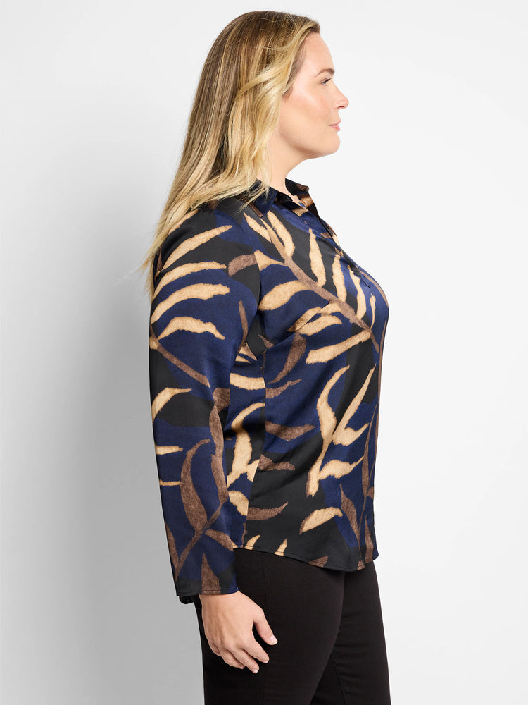 Navy, black, and beige long-sleeved shirt. Abstract leaf print. Collared.