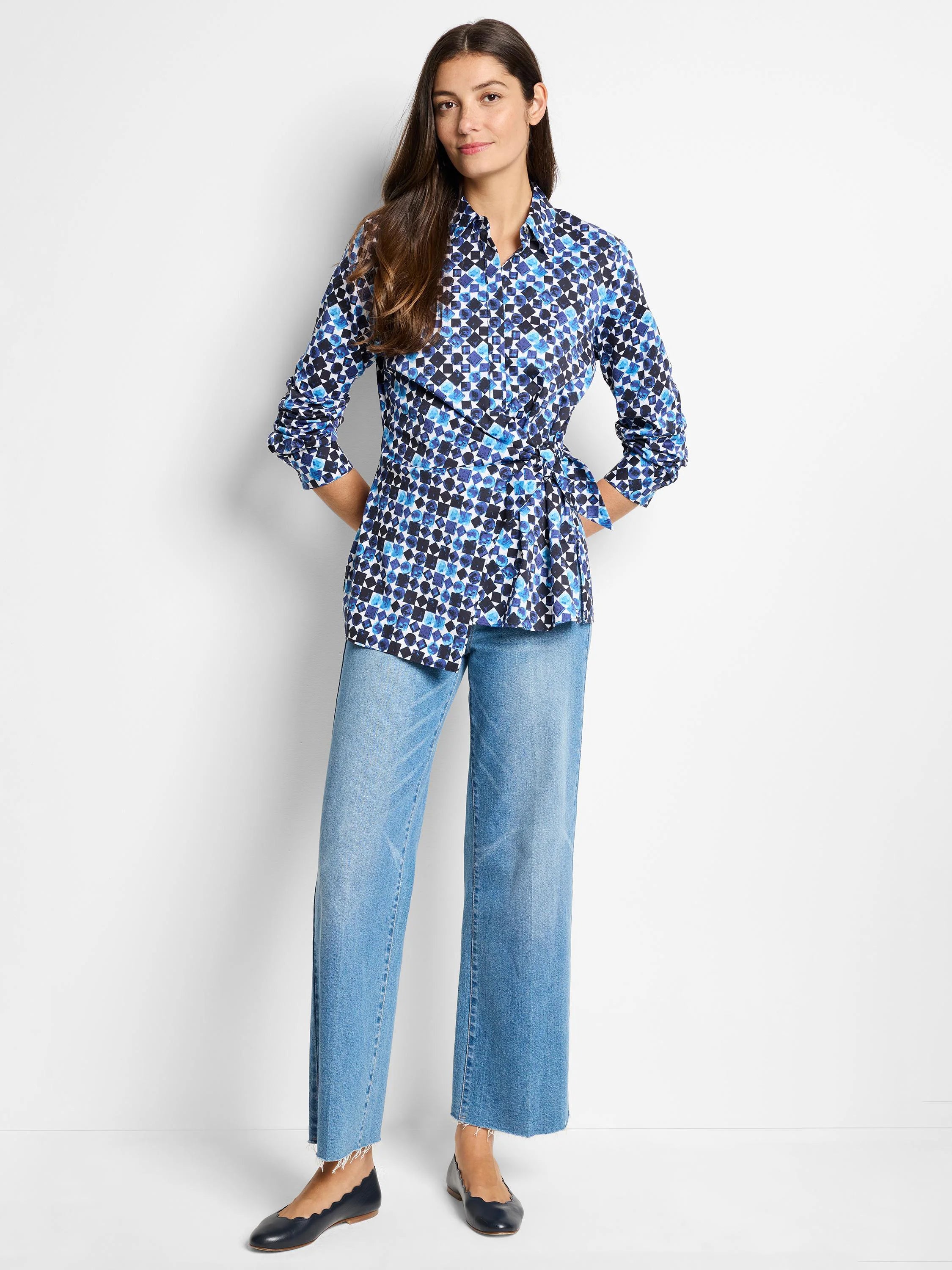 Blue and black geometric print shirt; side tie; long sleeves.