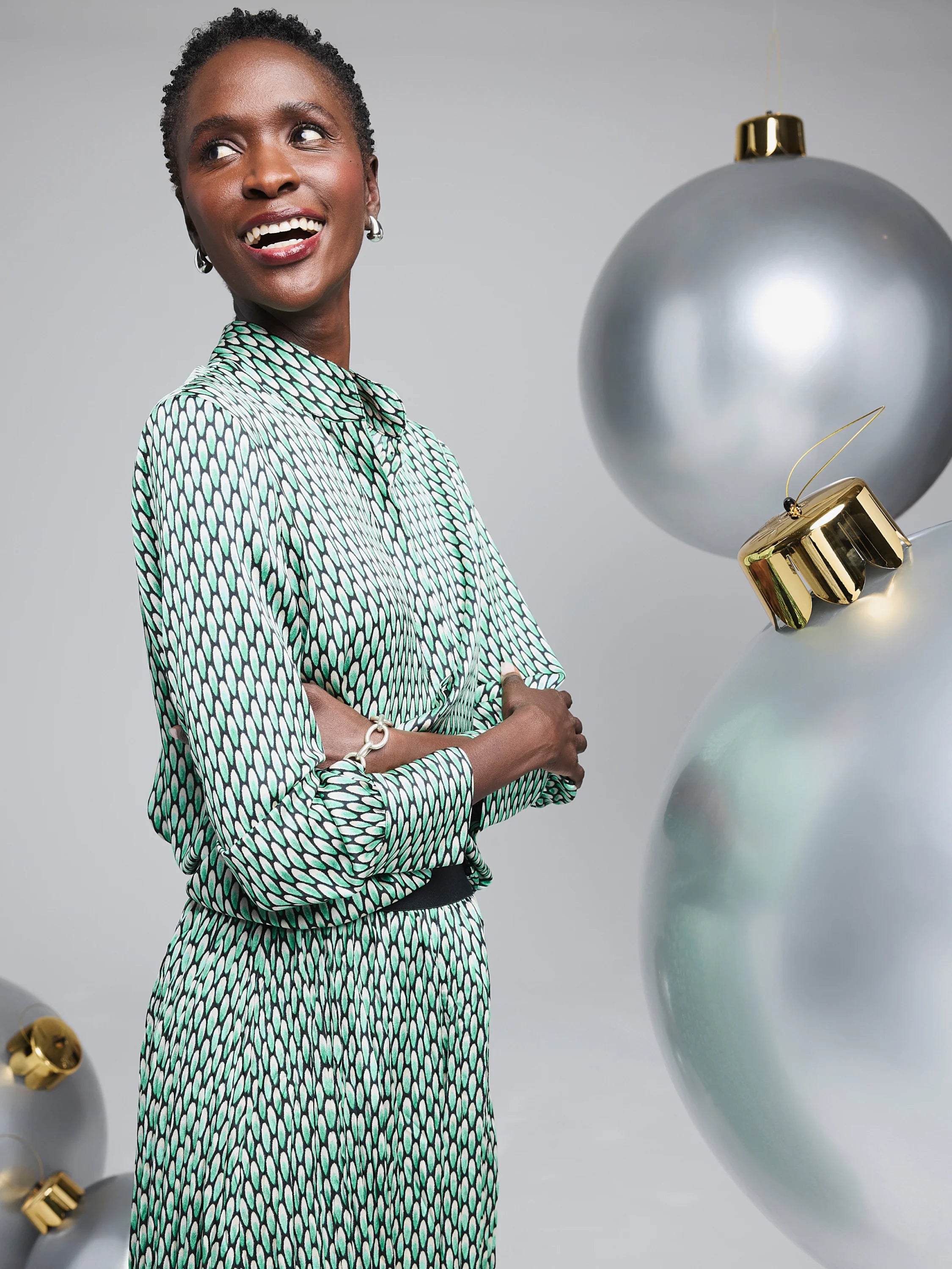 Green & white abstract dot print top and skirt. Pleated skirt.