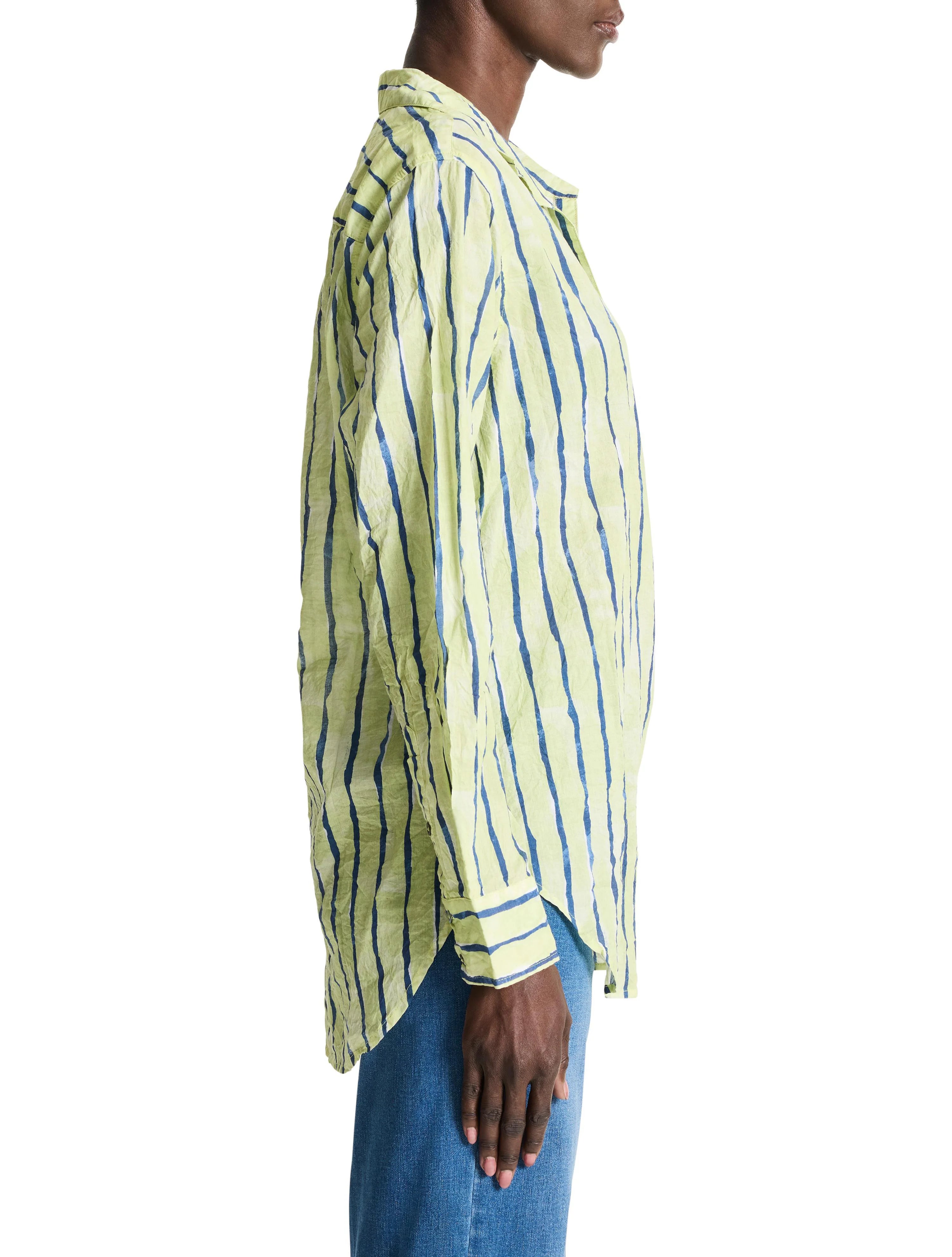 Lime green shirt with vertical blue watercolor stripes. Long sleeves, collared.