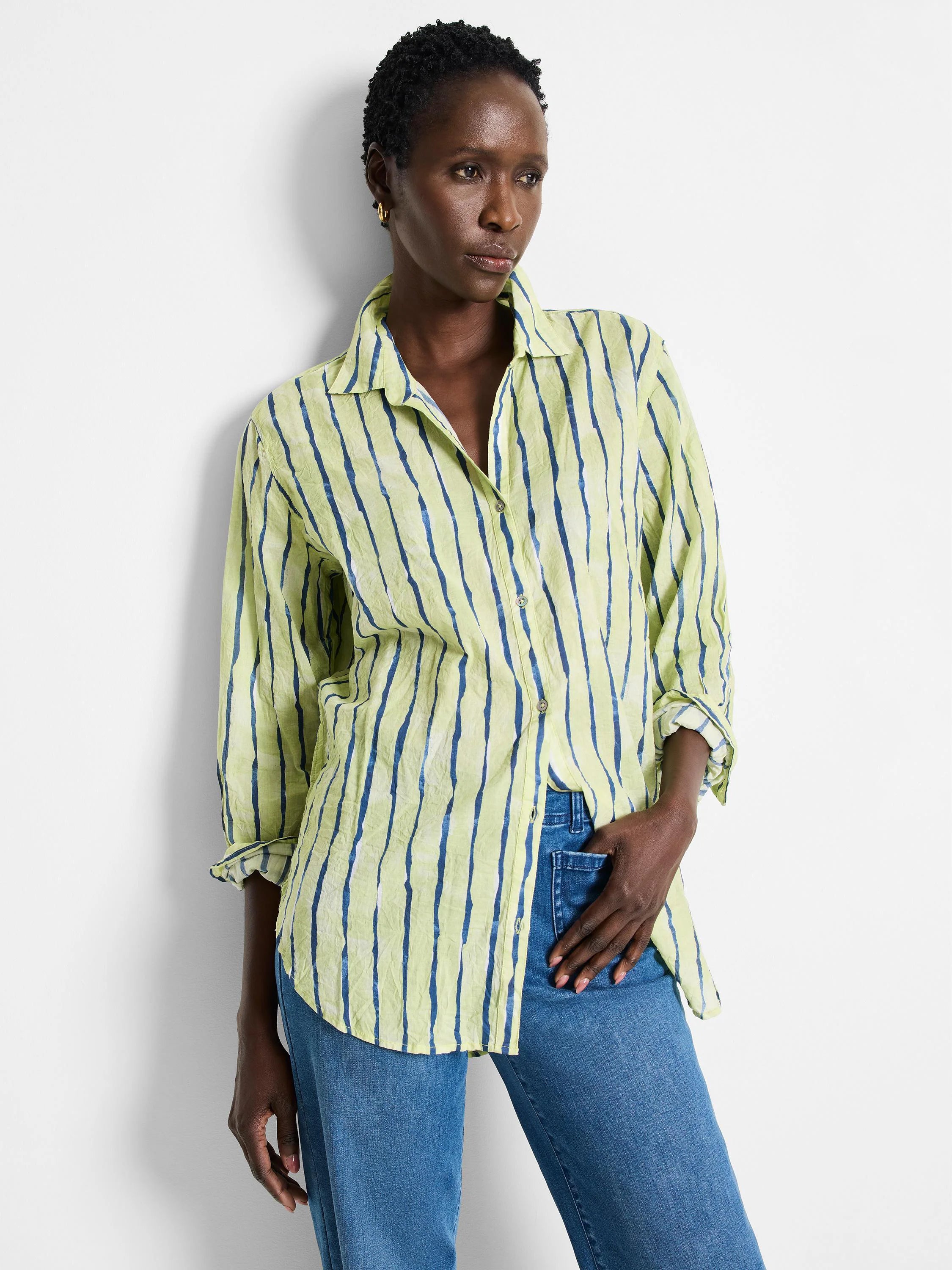 Lime green shirt with vertical dark teal stripes; long sleeves, button-down.