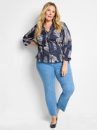 Dark navy shirt with off-white zebra stripes, 3/4 sleeves, button front.