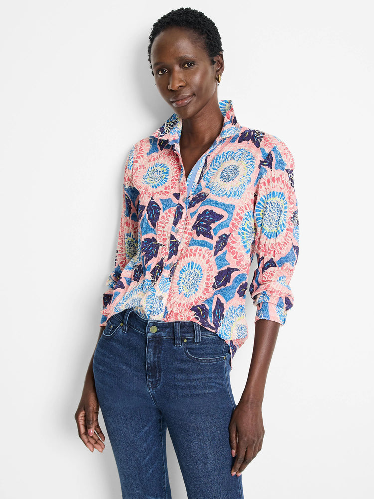 Cotton shirt; pink, blue, and dark-blue floral print on a crinkled fabric. Long sleeves, button-down.