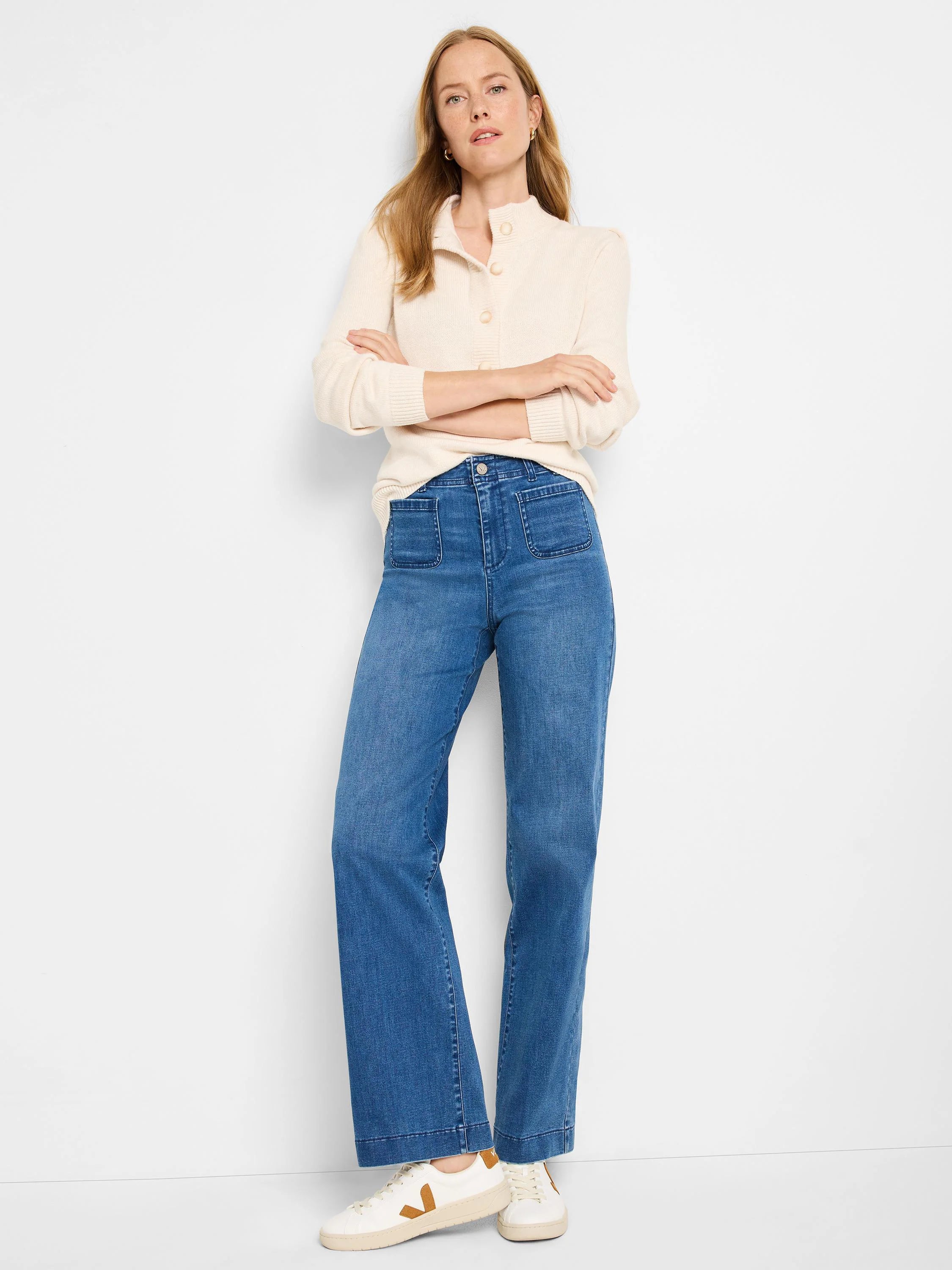 Medium blue high-rise wide-leg jeans with front patch pockets.