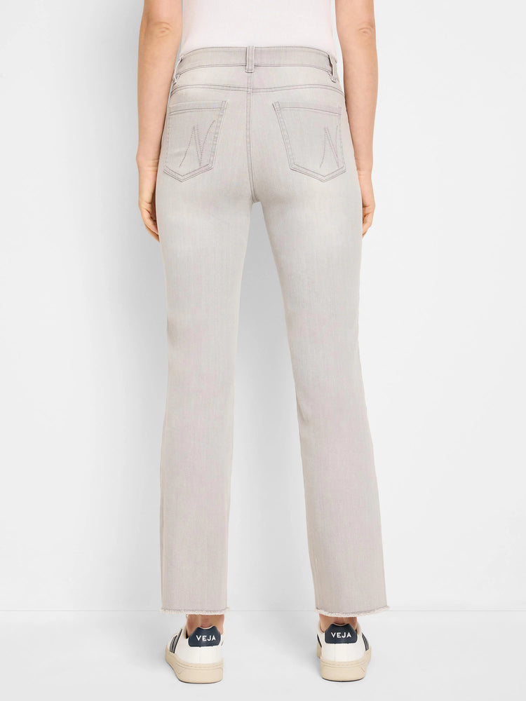 Light grey, faded demi boot jeans, back view, with decorative back pocket stitching and frayed hems.