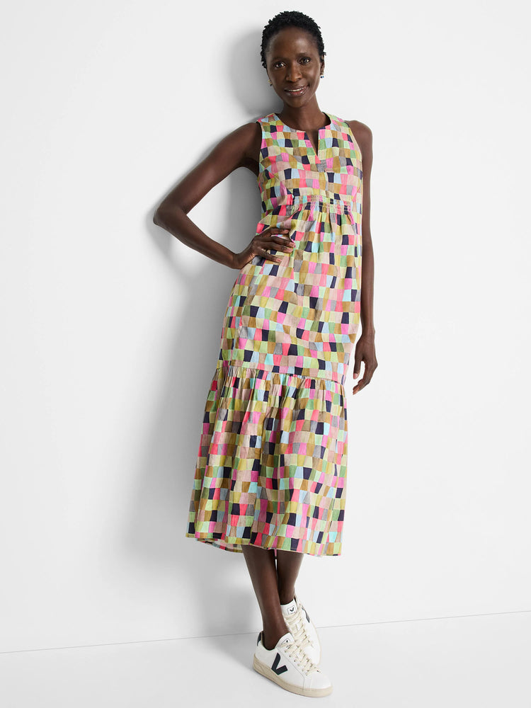 Midi dress, sleeveless, V-neck. Multicolored geometric print featuring pinks, greens, and blues. Tiered skirt.