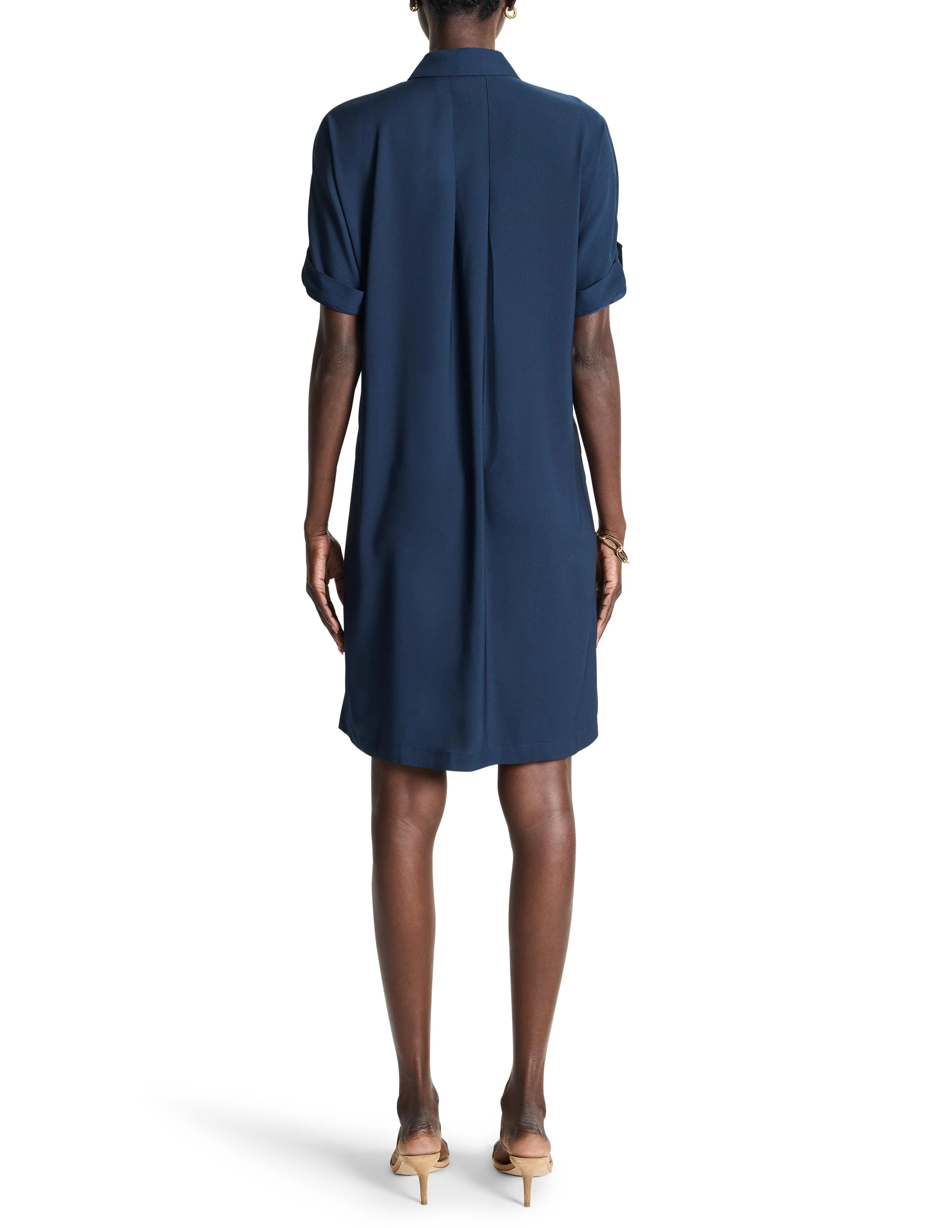 Dark blue collared shirt dress, cuffed short sleeves, knee-length, with back pleats.