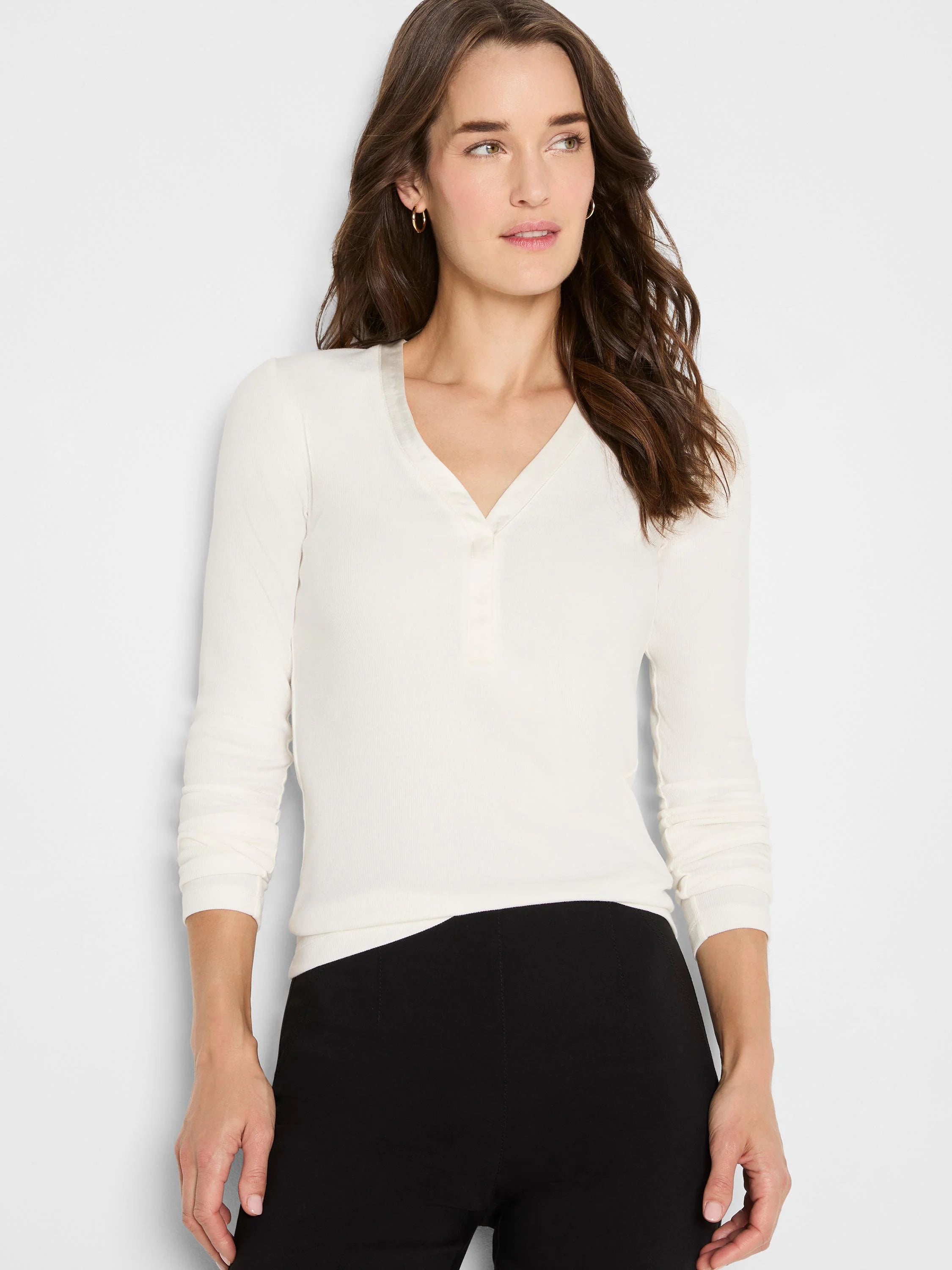 Cream ribbed V-neck top with a 3-button henley placket and subtle smooth trim on the neckline.
