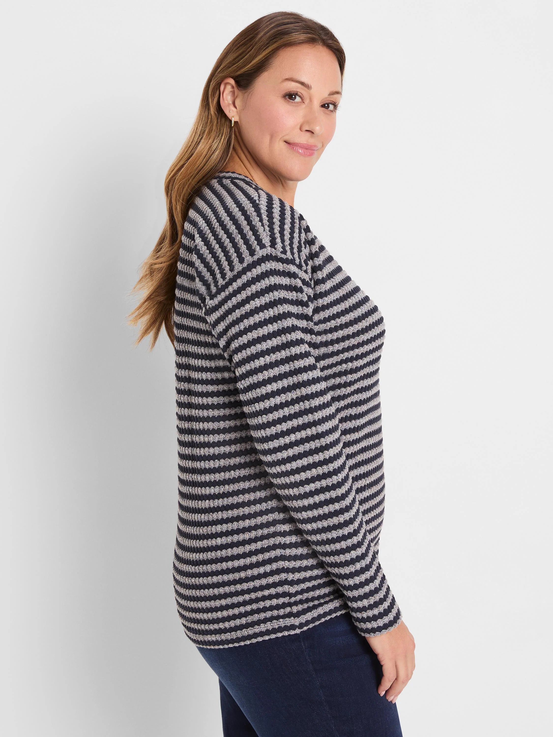 Long-sleeve top with horizontal navy blue and light grey textured stripes.