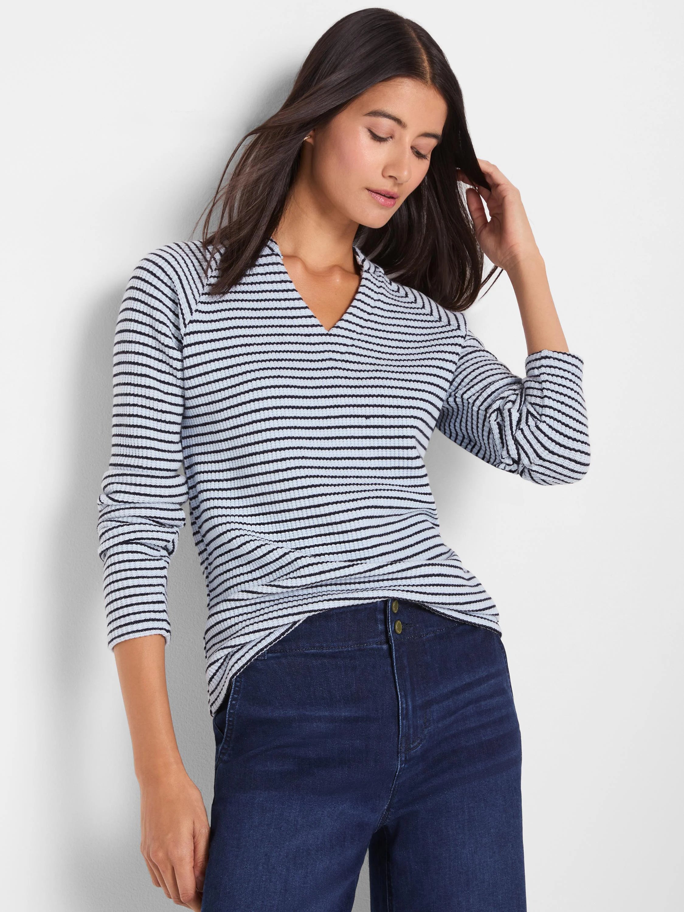 Light & dark blue striped thermal top with a split V-neck and long sleeves.