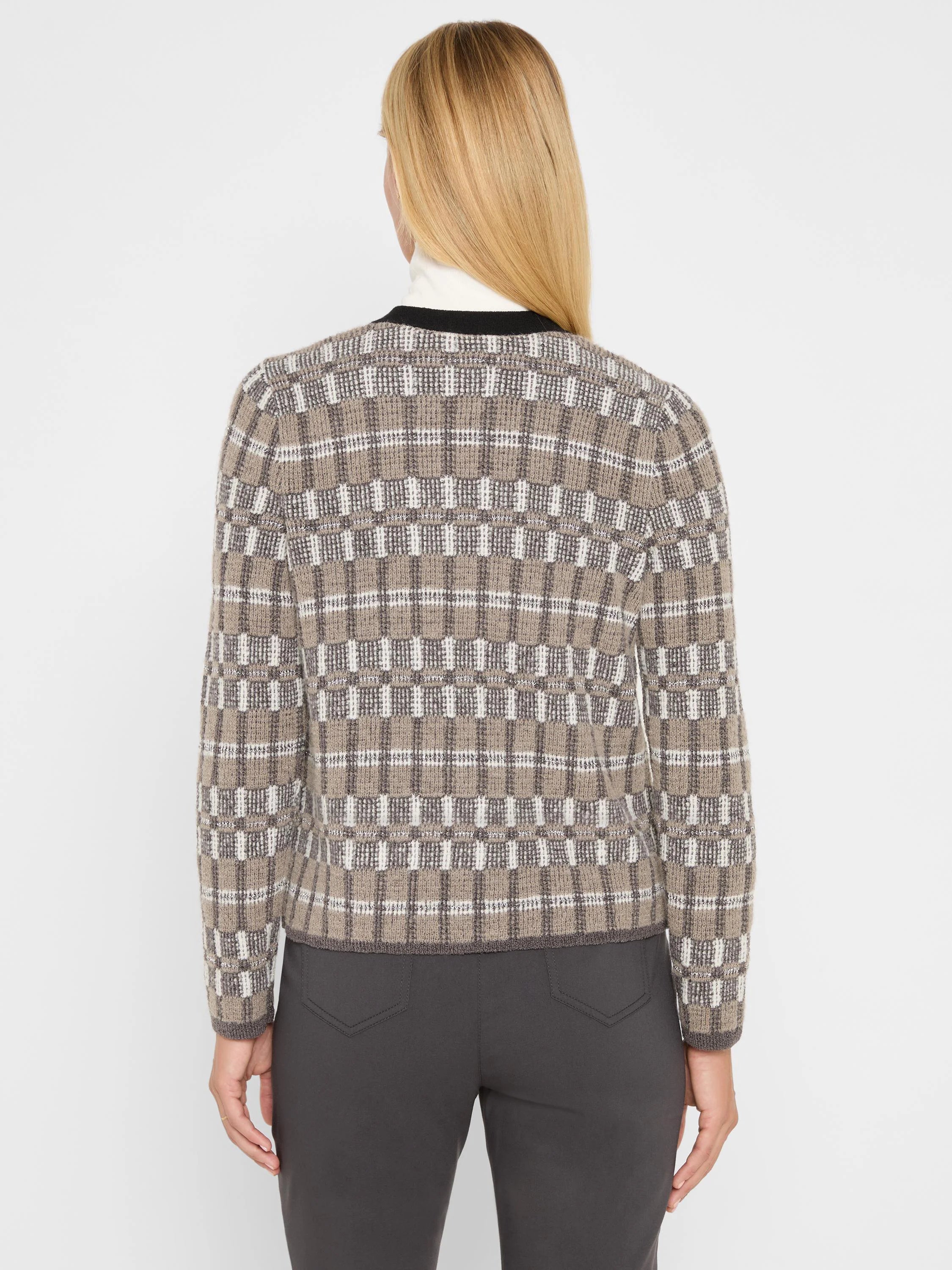 Cardigan with a grid pattern in beige, dark brown, and white, featuring silver threads. Rounded neckline with black trim.