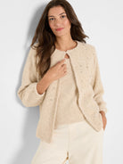 Oatmeal nep cardigan with subtle silver sparkle and scattered small clear rhinestones. Features a single hook closure.