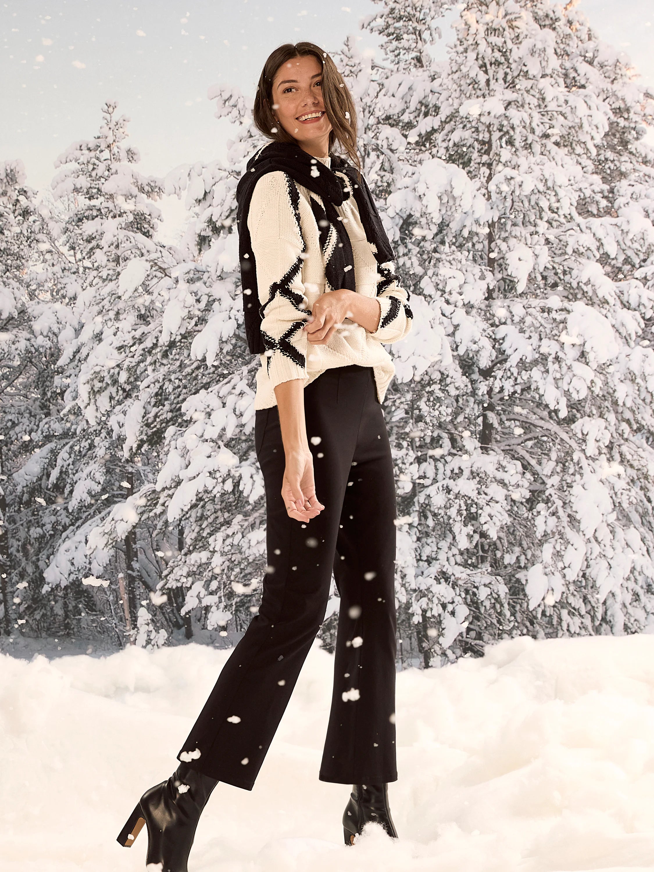 Cream sweater with black diagonal diamond pattern.