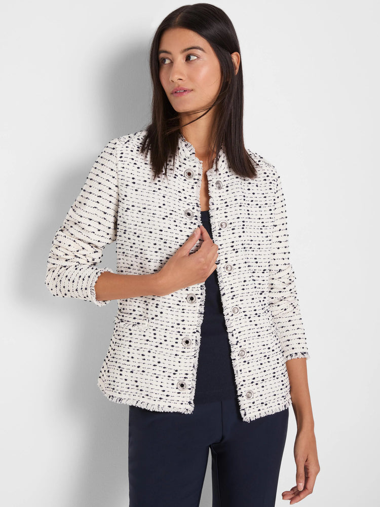 Cream & black nep weave jacket with fringe edges, collarless, and silver snaps. 3/4 sleeves.