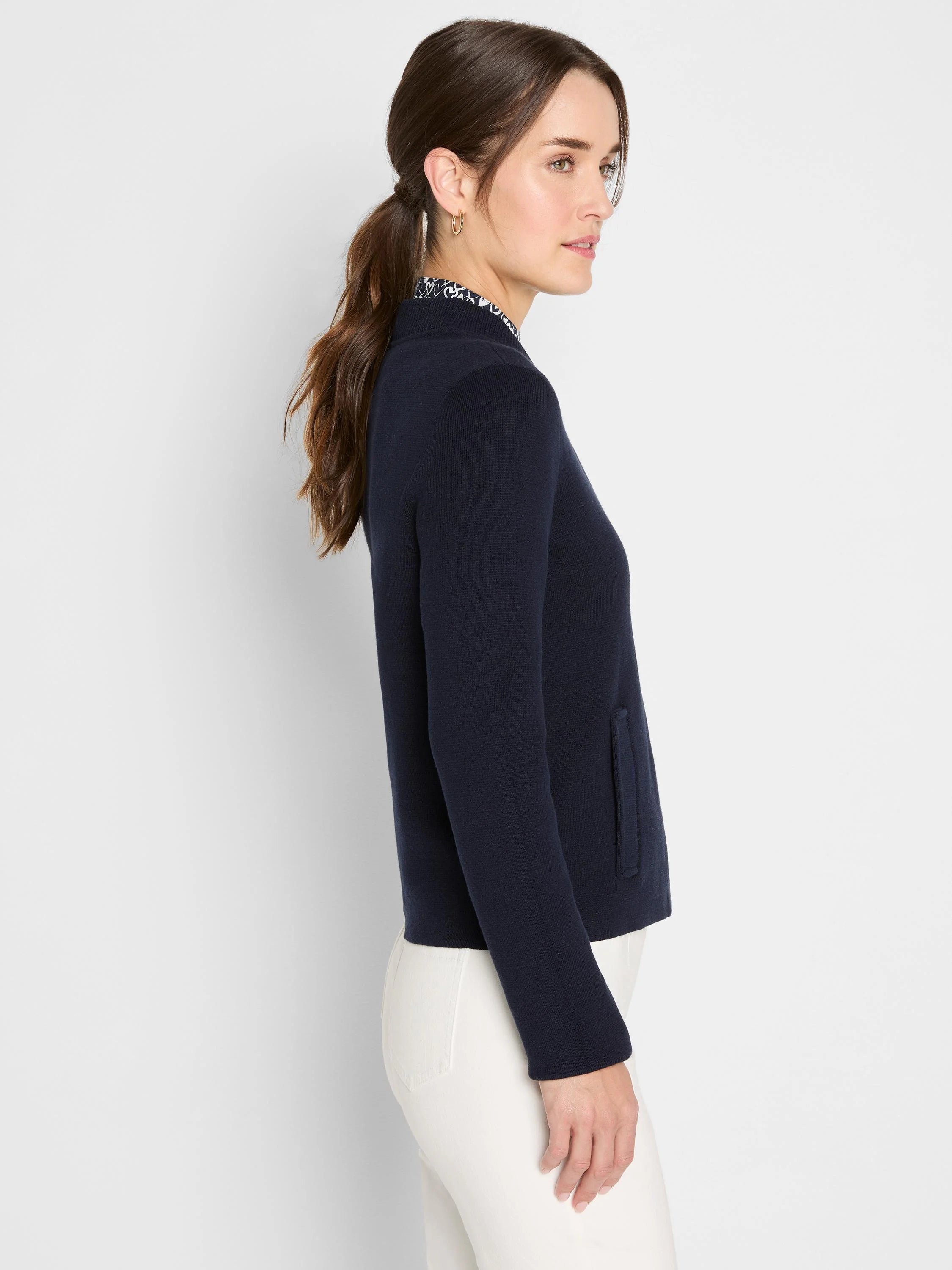 Dark navy knit bomber jacket with a patterned stand-up collar and a visible side pocket.