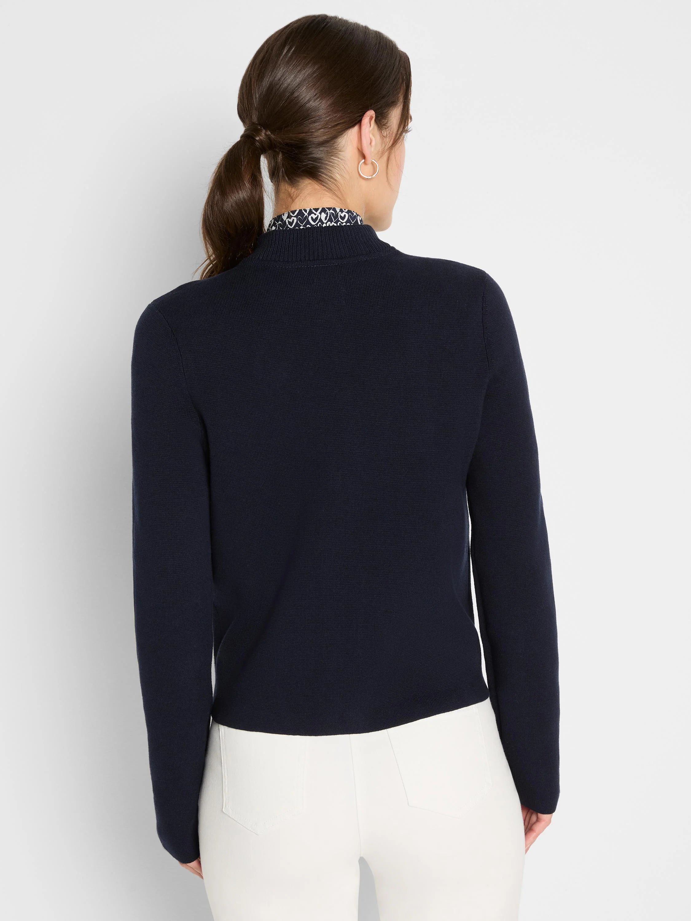 Dark navy knit bomber jacket with a mock neck and long sleeves, shown from the back.
