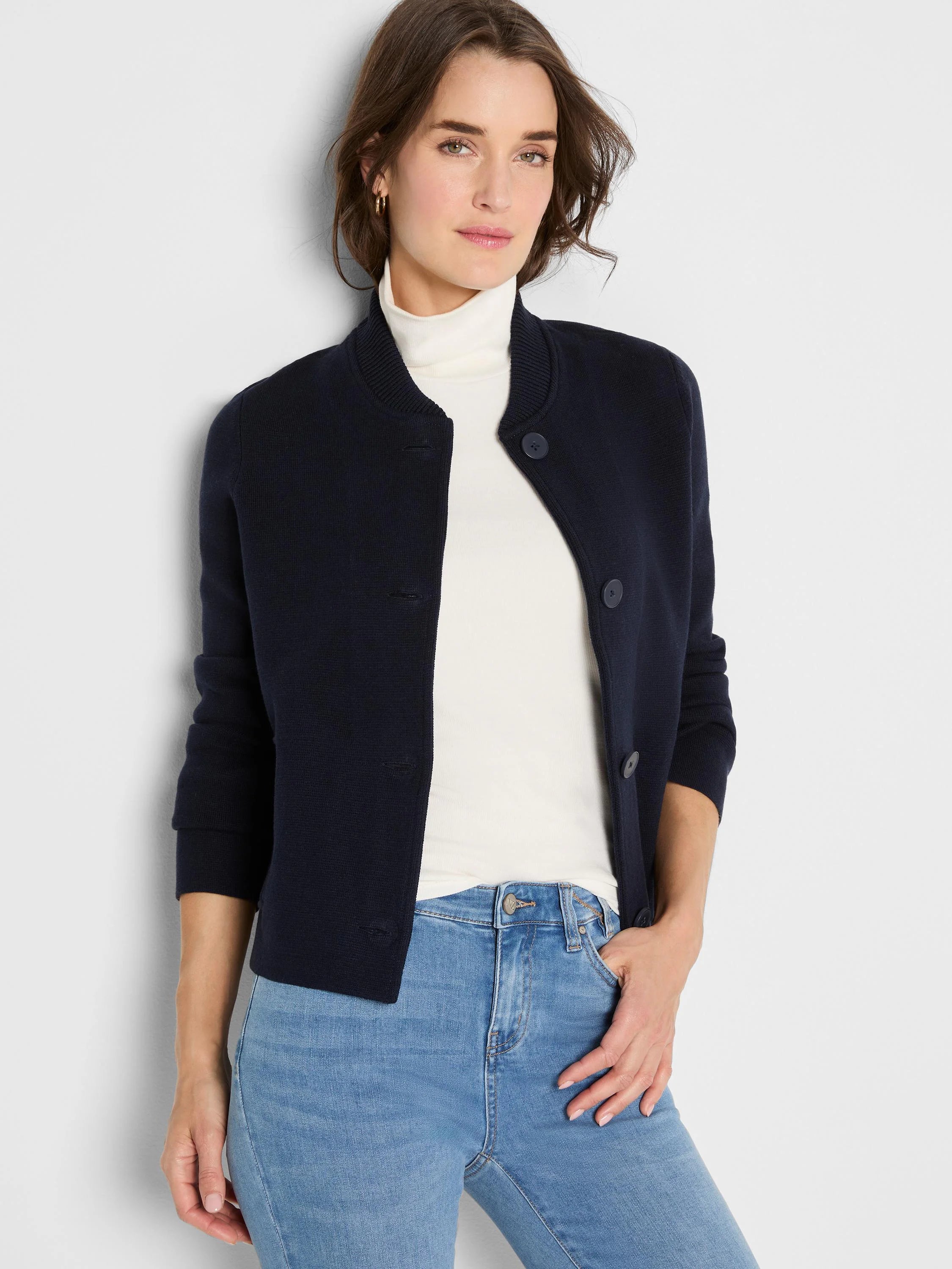 Navy knit bomber jacket with a ribbed collar and button front.