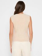 Oatmeal sleeveless tank top with fuzzy, textured lurex nep fabric, seen from the back on a model.