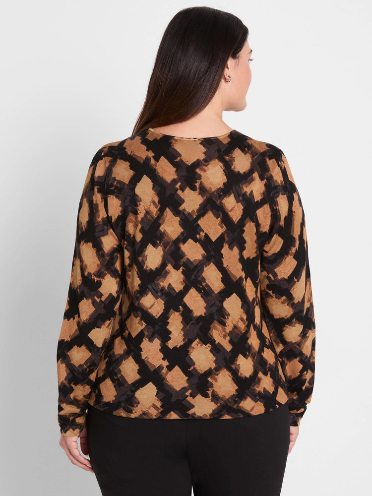 Back view of a long-sleeve sweater with brown and black brushstroke-style check pattern.