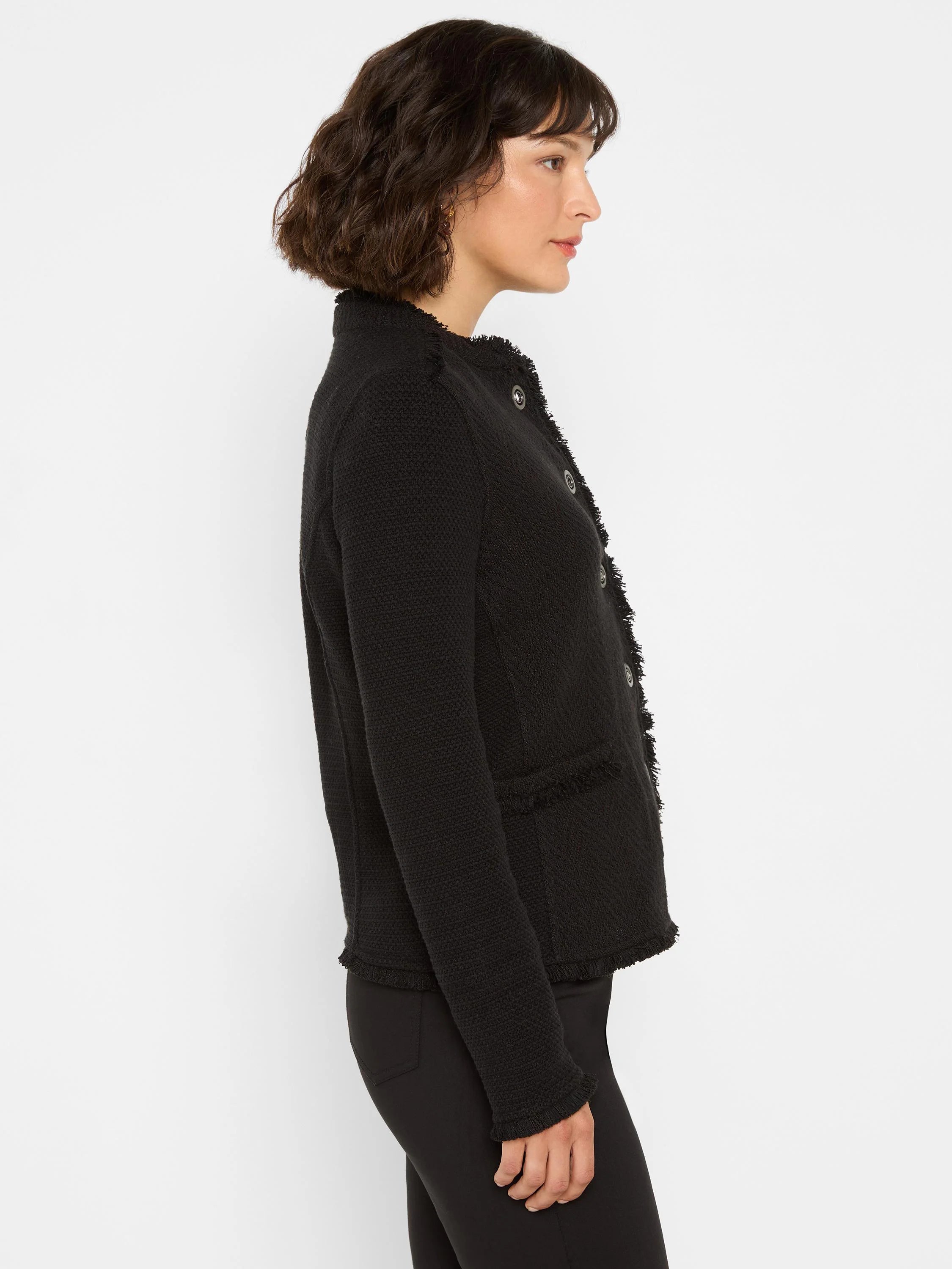 Black mix knit jacket with fringe trim on collar, placket, cuffs & pockets. Features silver military-style buttons.