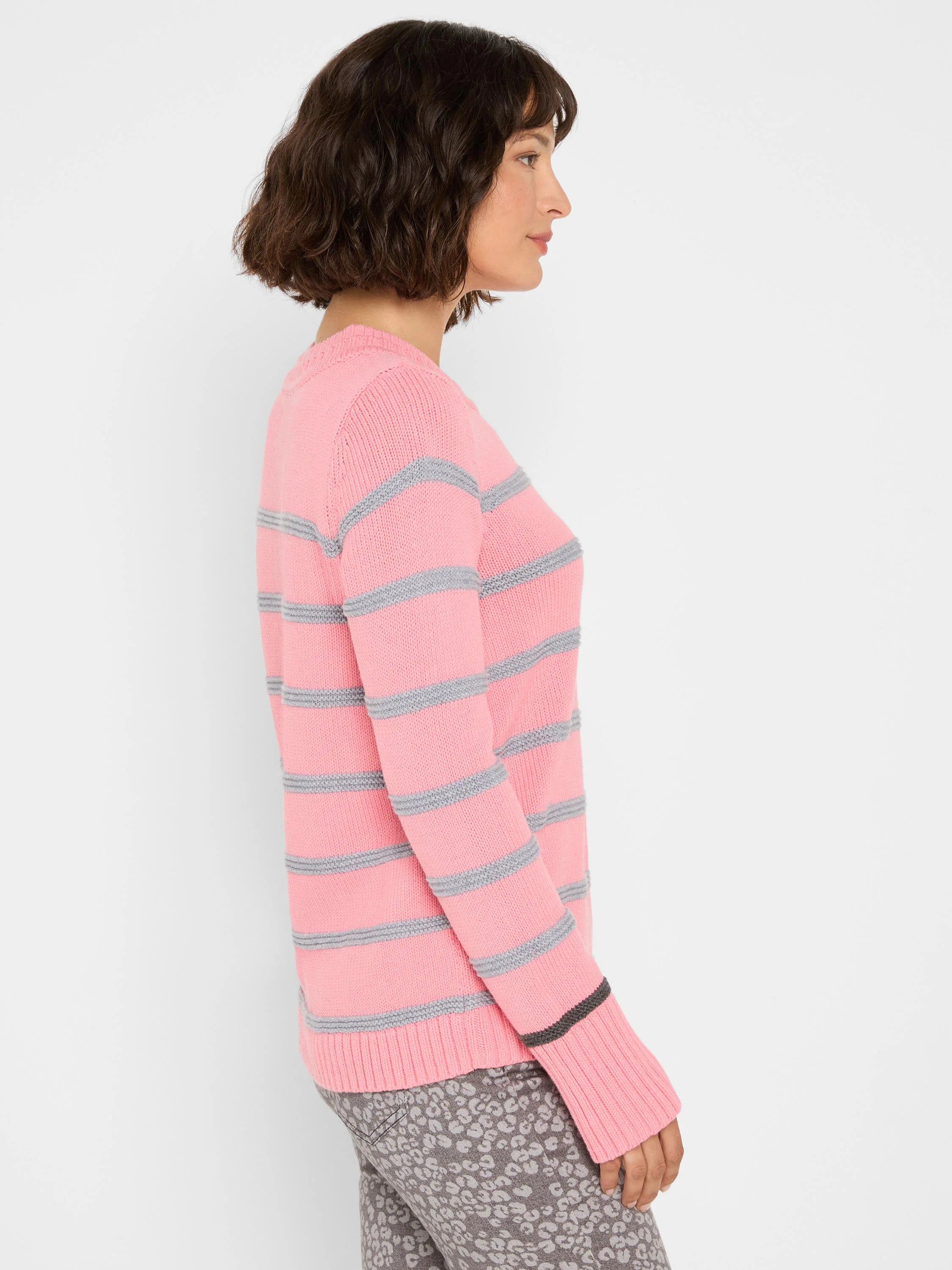 Pink knit sweater with horizontal grey stripes. Darker grey stripe on ribbed cuffs.