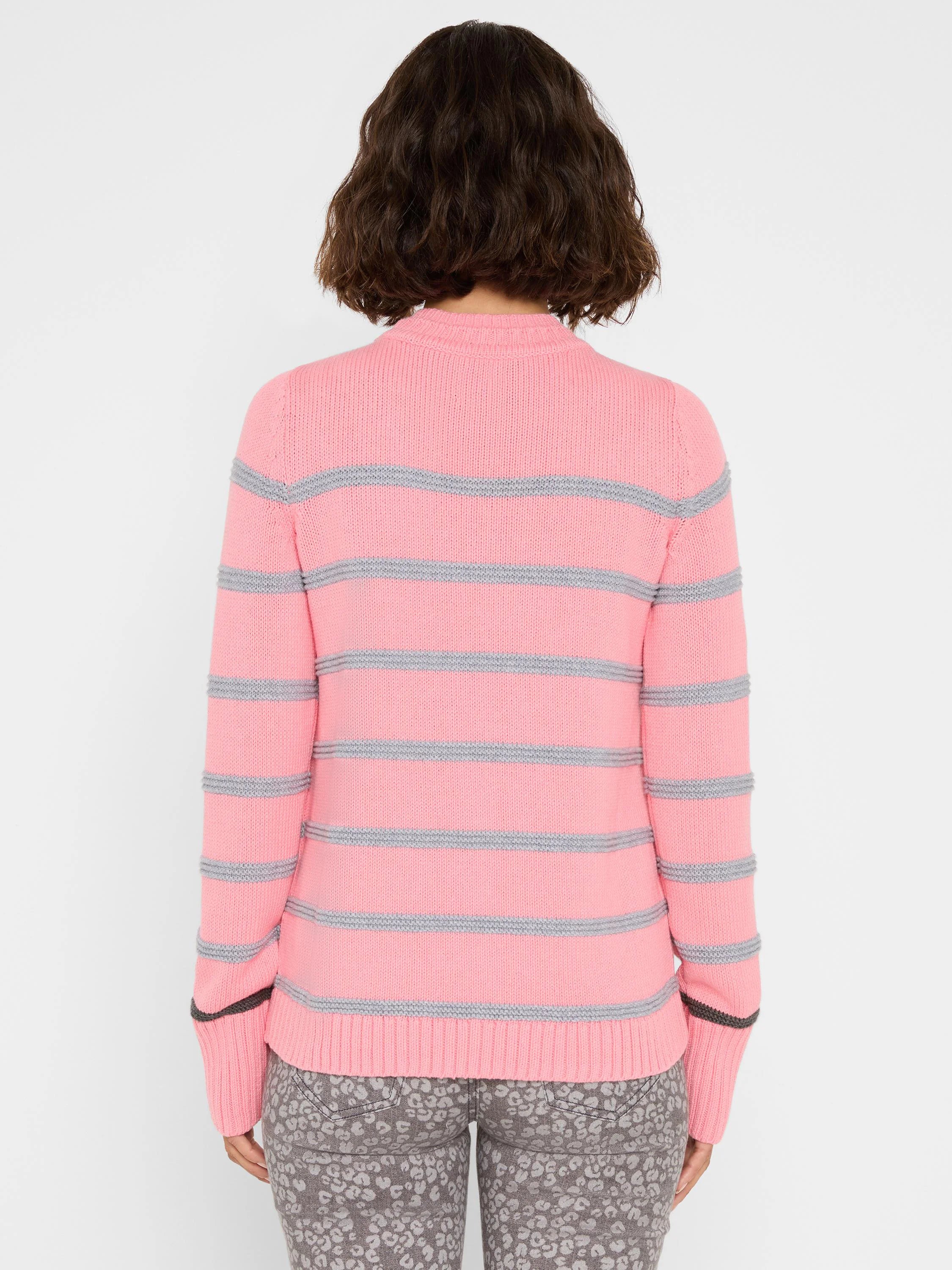 Pink knit sweater with horizontal gray stripes on body and sleeves. Darker gray accent stripes on cuffs.