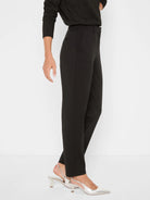Black ponte knit trousers, high-waisted with belt loops, straight leg, and a subtle front crease.