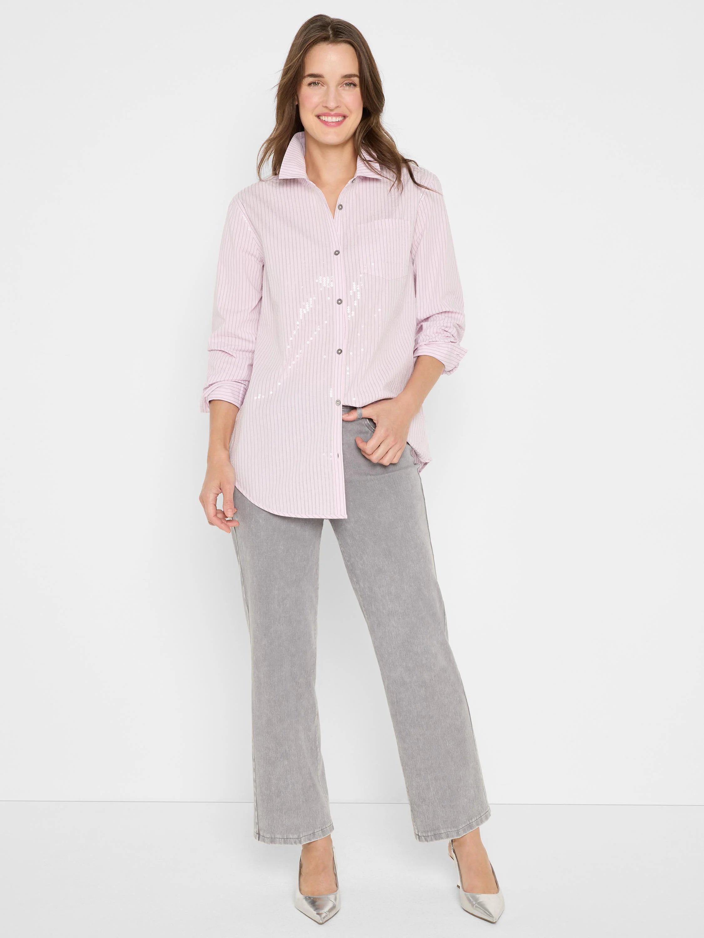 Light pink button-down shirt with thin vertical stripes and scattered subtle shine.