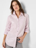 Light pink striped button-down shirt with thin grey lines, scattered sequins, and rolled sleeves.