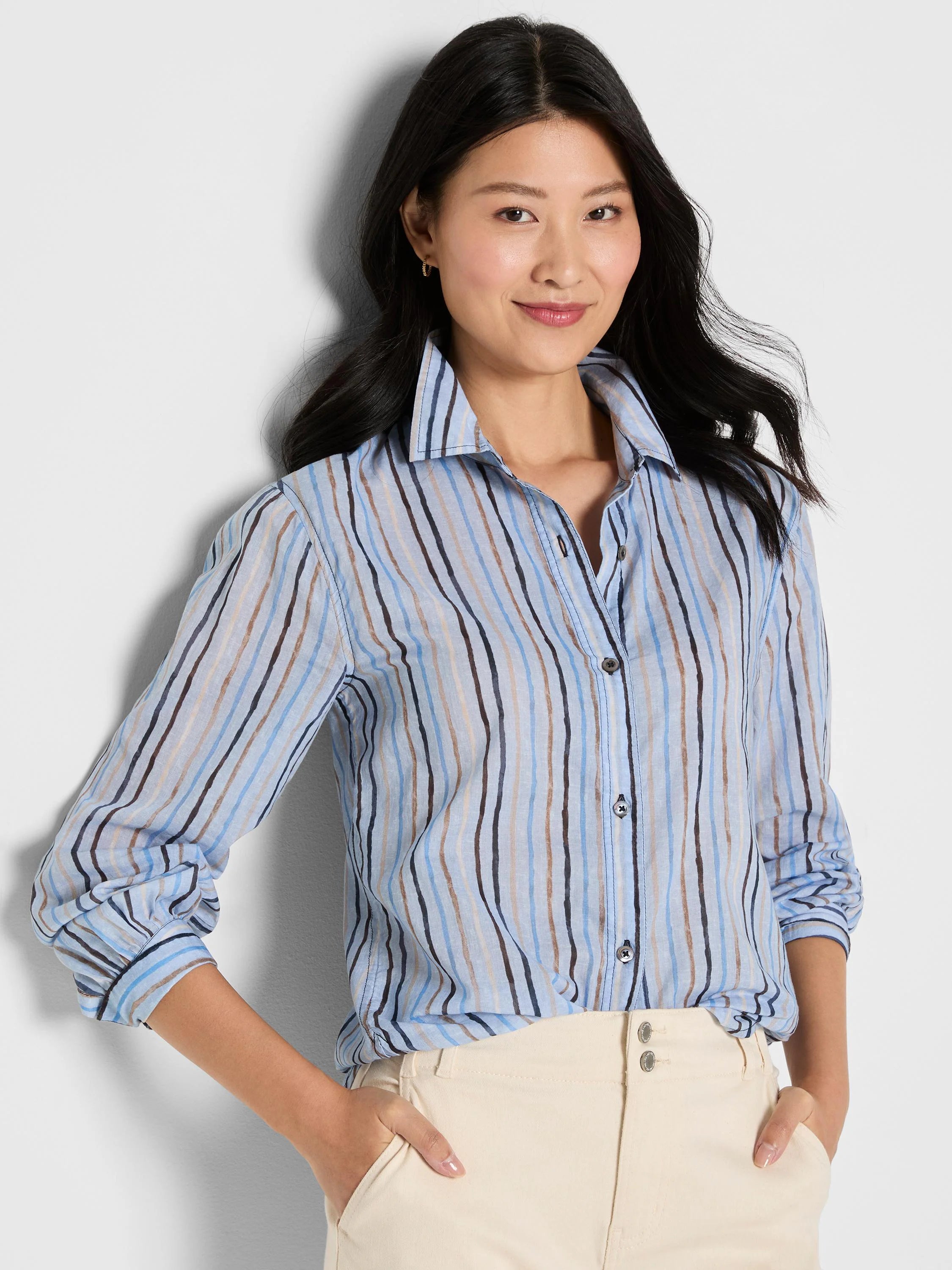 Collared cotton shirt with painted vertical stripes in shades of blue, brown, and dark navy.