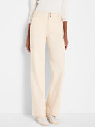 Cream wide-leg trouser jeans, high waist with two silver buttons.