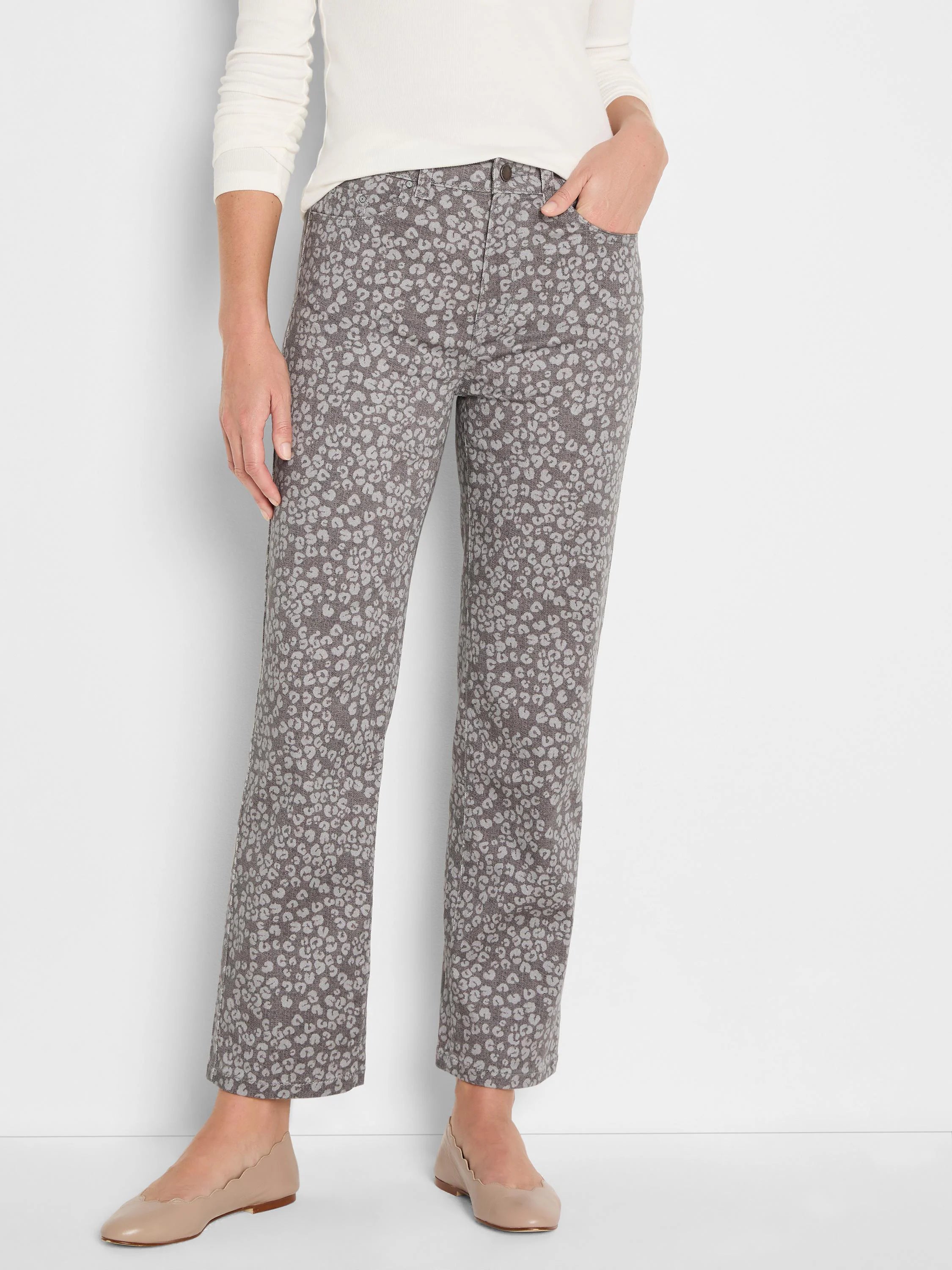 Straight ankle jeans, dark taupe base with light grey leopard print pattern.