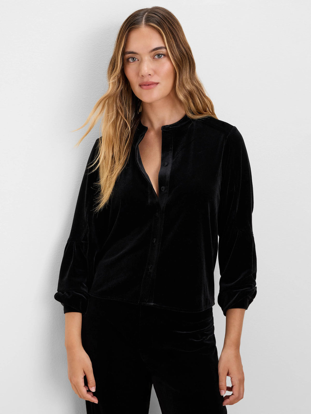 Black velvet top with a band collar, satin-trimmed button-front, and 3/4 puff sleeves.