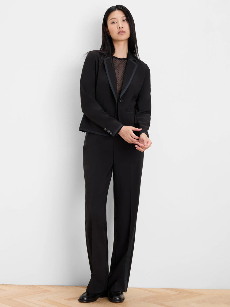 Black sheer top with scattered velveteen dots.