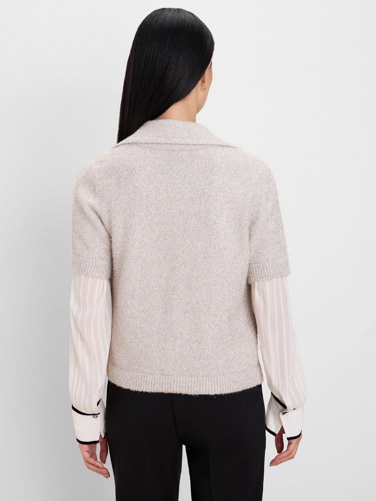 Light beige short-sleeve fuzzy knit cardigan with shimmering threads and a lapel collar.