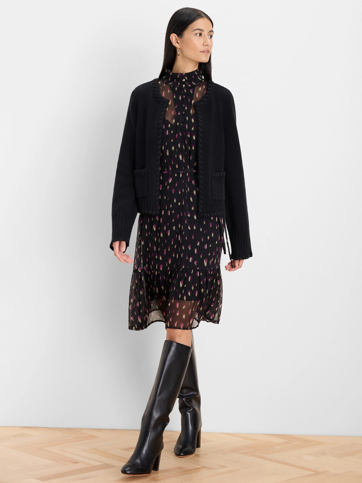 Black short cardigan jacket with braided Latigo lace trim along the open front, neckline, and patch pockets.