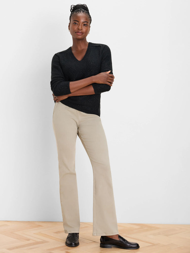 Black V-neck sweater with subtle sparkle knit texture.