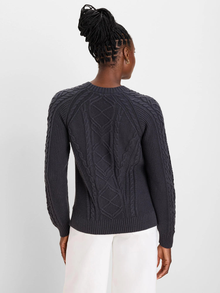 Dark gray sweater with intricate, varied cable knit patterns on the back and sleeves; ribbed cuffs and hem.