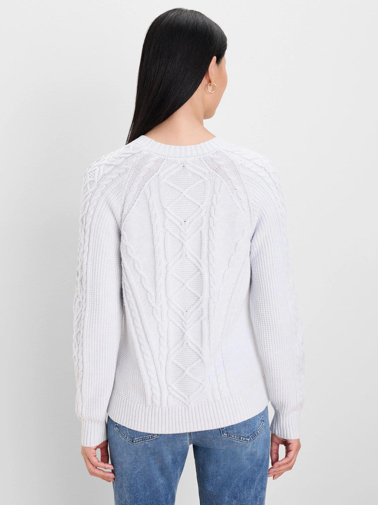 Pale gray cable knit sweater, back view, showing a mix of diamond and rope cable patterns with ribbed trim.
