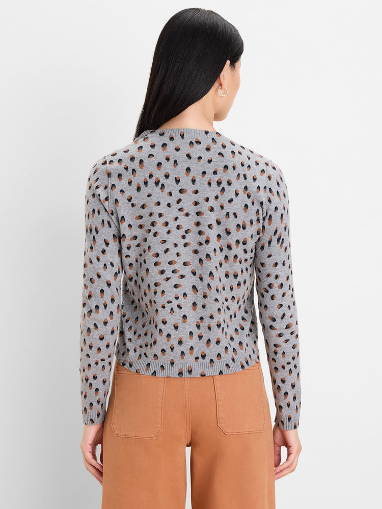 Grey long-sleeve cardigan with irregular black and brown dots.