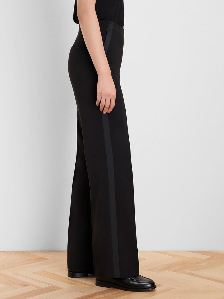 Black wide-leg pants with a subtle black grosgrain stripe vertically on each outer seam and along the side pockets.