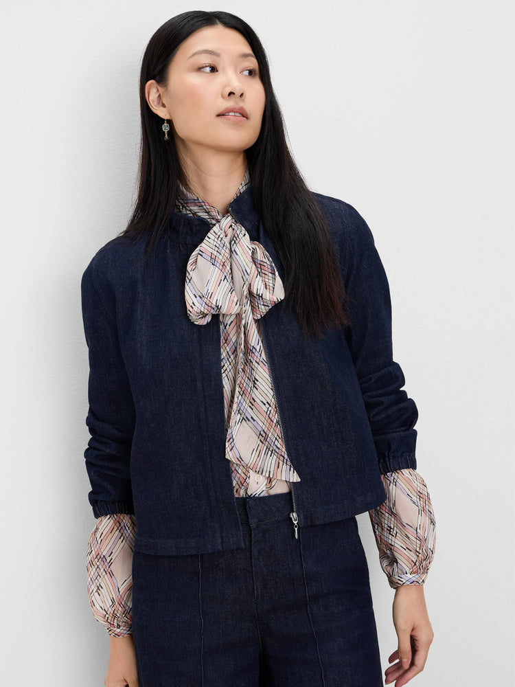Cropped dark blue denim jacket with full-zip, standing collar, and elasticized cuffs.