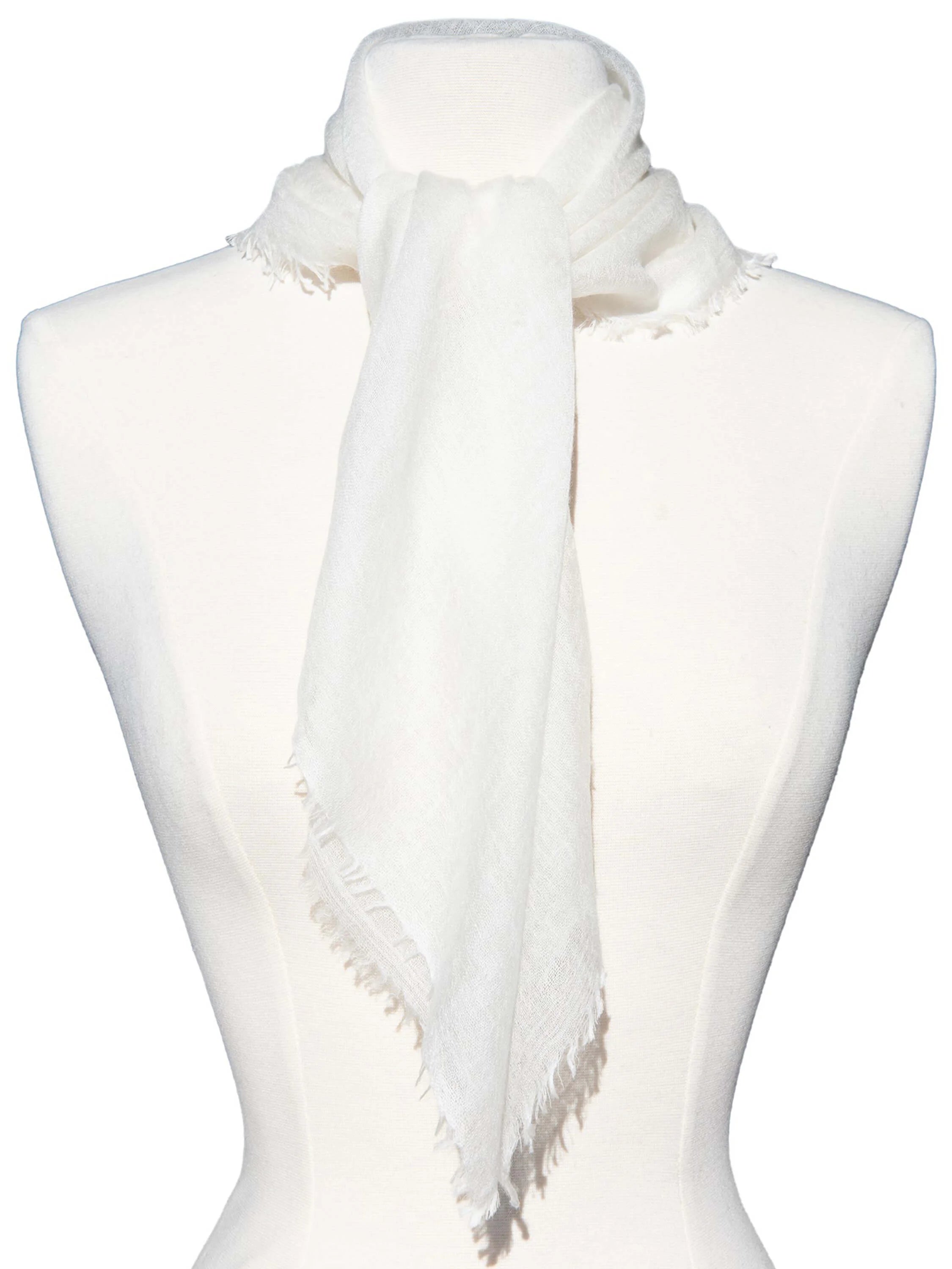 Off-white cashmere neck scarf tied on a mannequin, featuring frayed edges.
