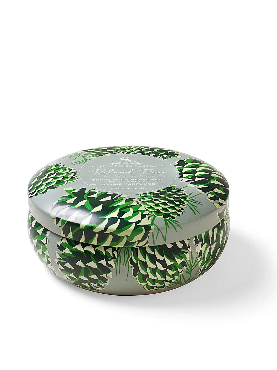 Round gray tin candle with a green pinecone and pine needle pattern.
