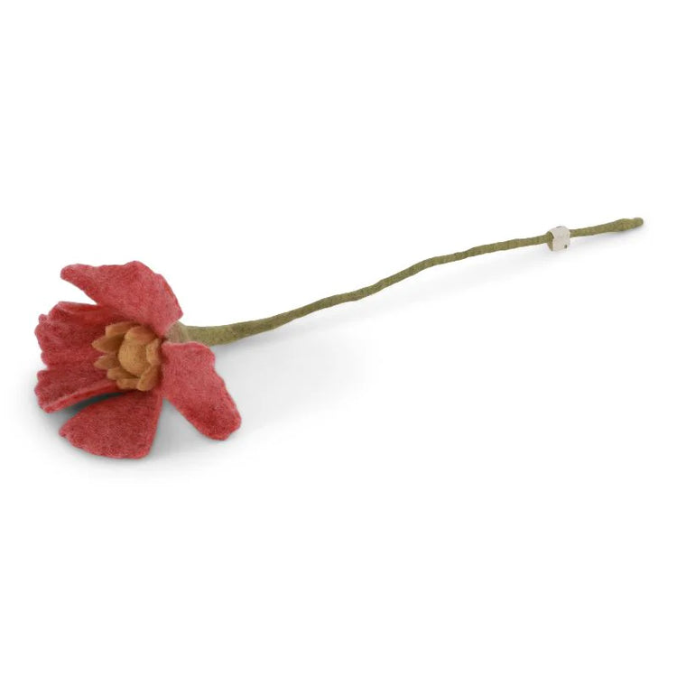 Reddish-pink felt poppy flower with a yellow center and a long green stem, featuring a small white bead.