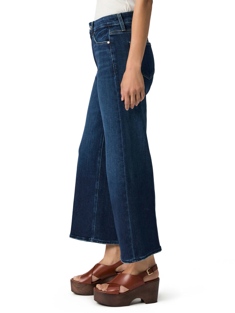 Dark blue, high-waisted wide-leg jeans with a finished hem, classic pockets, and contrast stitching.