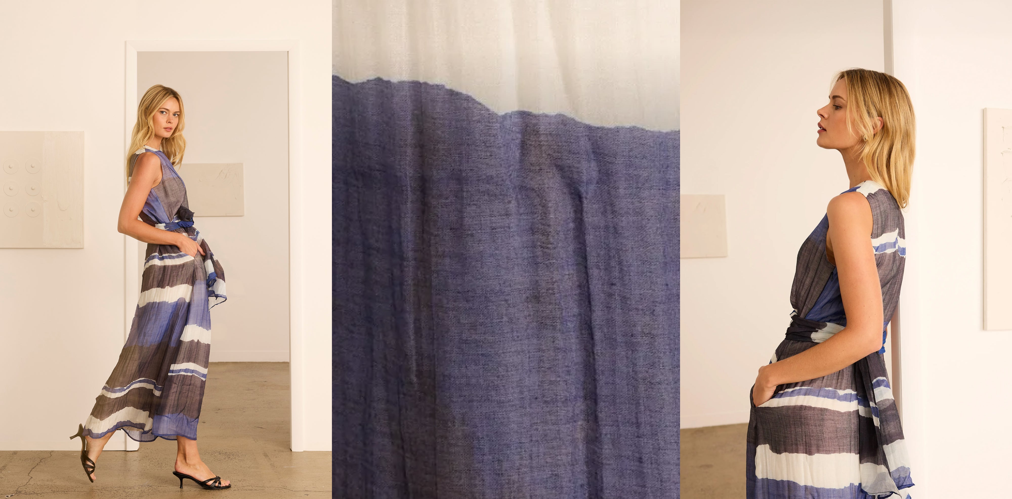 Woman wearing a blue and white striped dress in a minimal indoor setting.