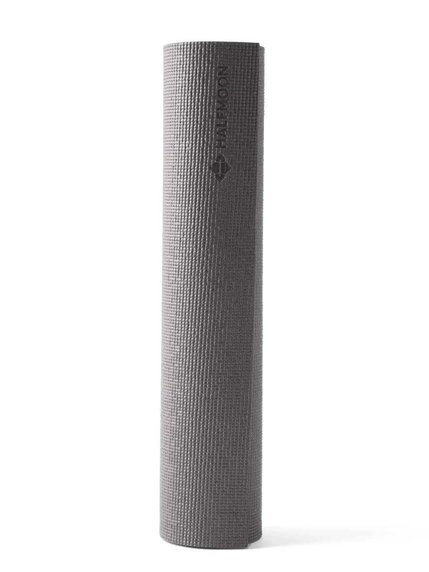 Rolled up dark gray yoga mat with a textured surface, standing vertically. "HALFMOON" logo near the top.