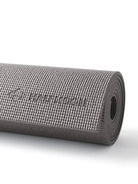 Rolled dark gray yoga mat with a dimpled surface texture and an embossed 'HALFMOON' logo.